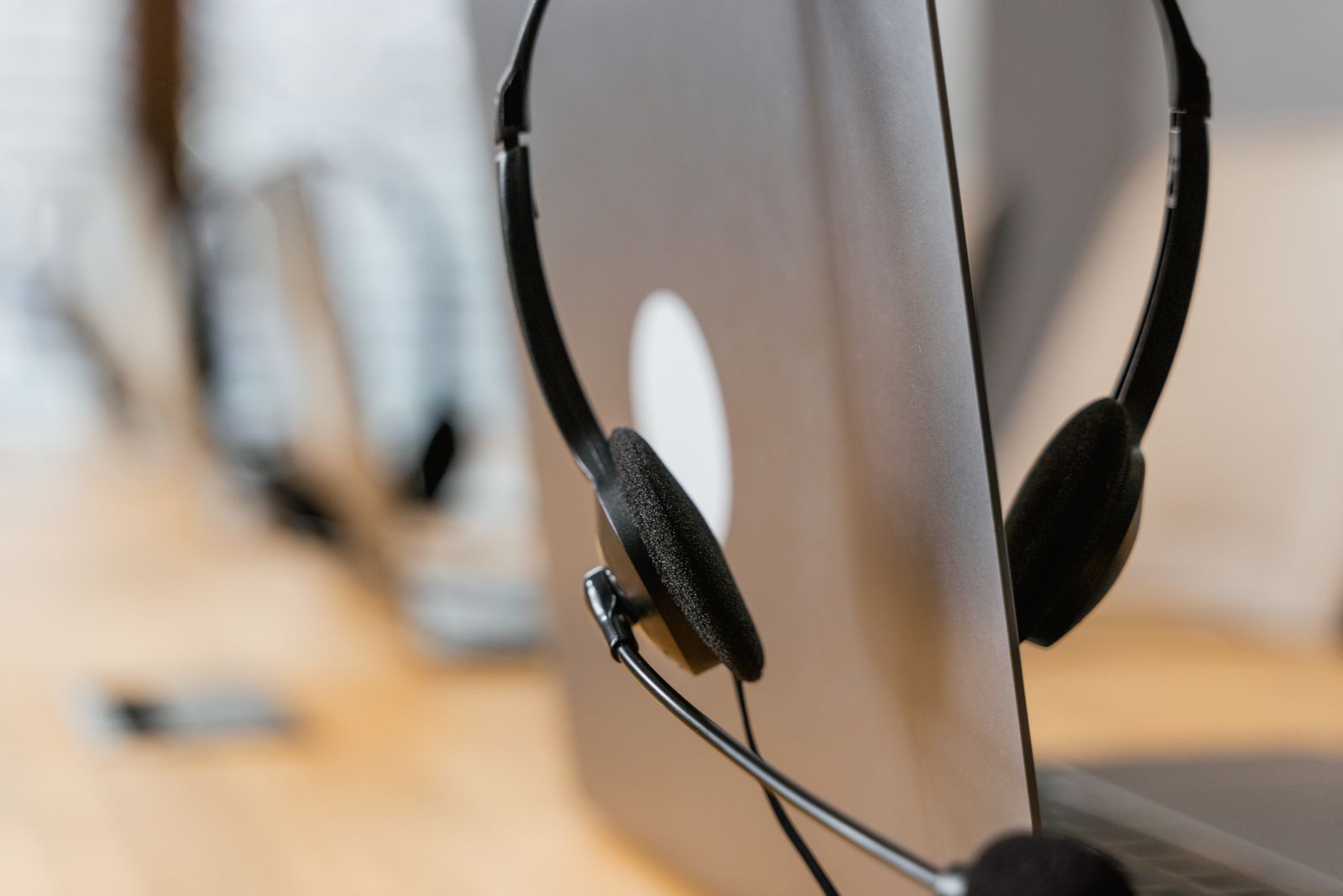 Headset resting on a laptop keyboard